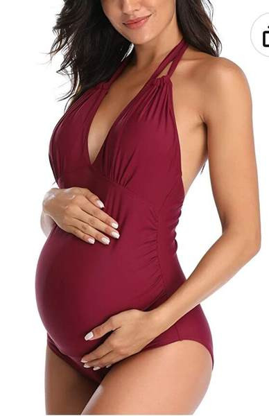 Vientisas moteriškas maudymosi kostiumėlis su siaura iškirpte