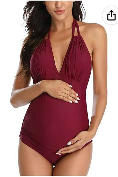 Vientisas moteriškas maudymosi kostiumėlis su siaura iškirpte