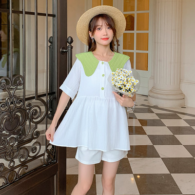 Laisvo rašto nėščiųjų palaidinė su 3/4 rankovėmis ir ovalia iškirpte