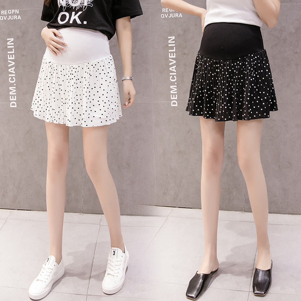 Къса разкроена пола на точки подходящи за бременни