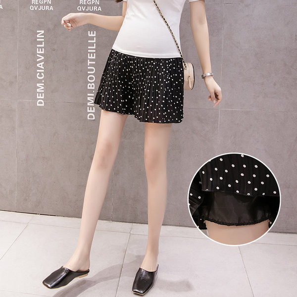 Къса разкроена пола на точки подходящи за бременни