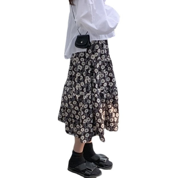 Разкроена пола с флорален десен подходяща за бременни