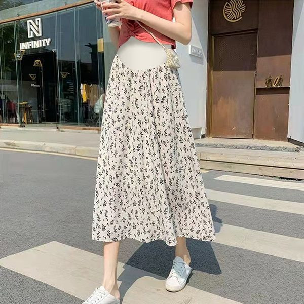 Ležerna trudnička suknja s visokim strukom i cvjetnim motivima