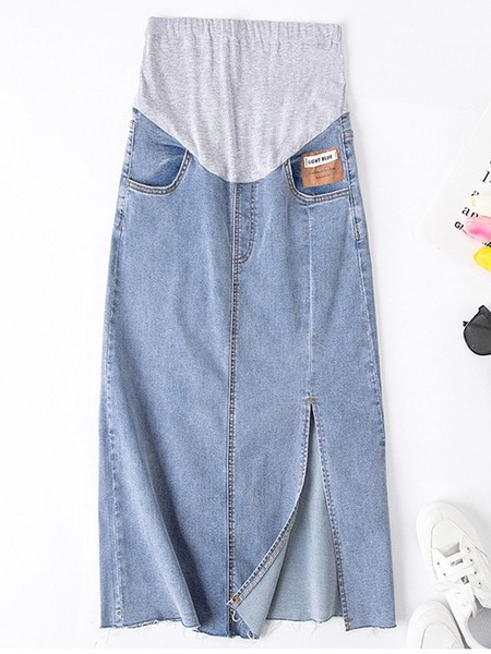 Duga ravna suknja s prorezom sa strane pogodna za trudnice