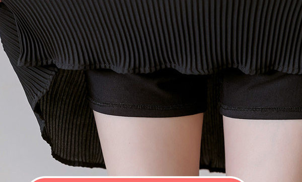 Къса плисирана пола с широк ластик подходяща за бременни