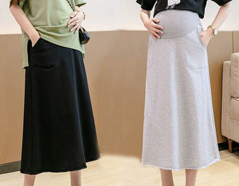 Γυναικεία μονόχρωμη φούστα με τσέπες - για εγκύους