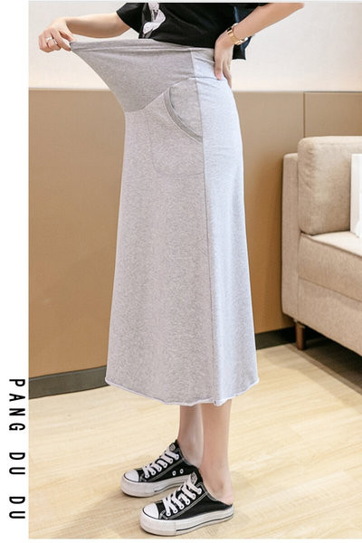 Ženska jednobojna suknja sa džepovima - za trudnice