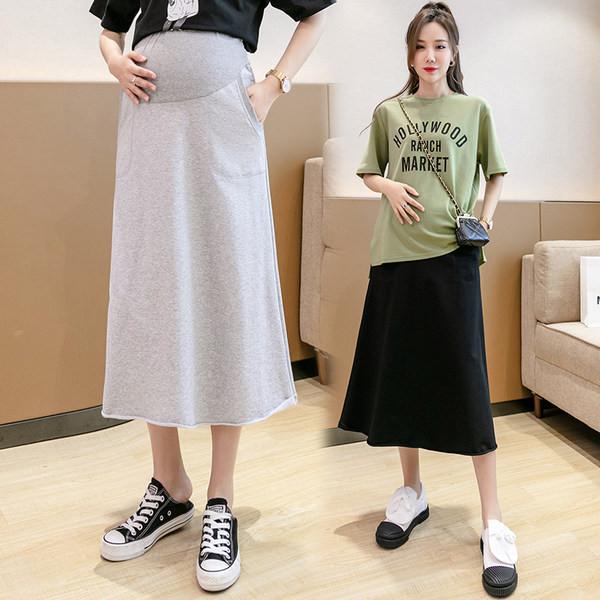 Ženska jednobojna suknja sa džepovima - za trudnice