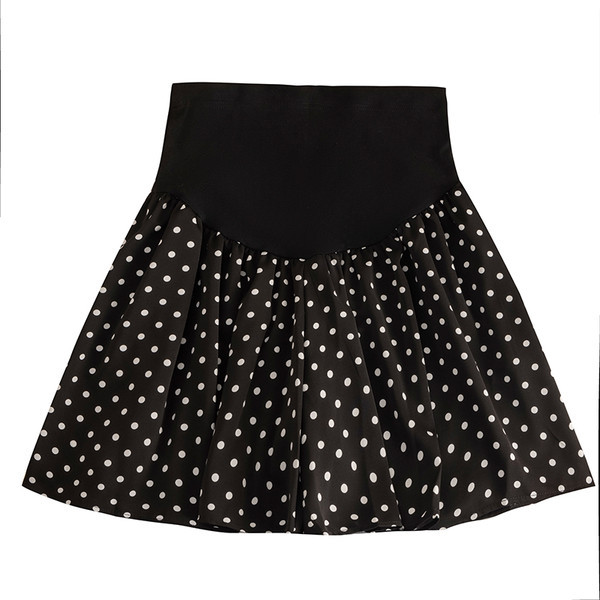 Moderna ženska suknja za trudnice na točkice