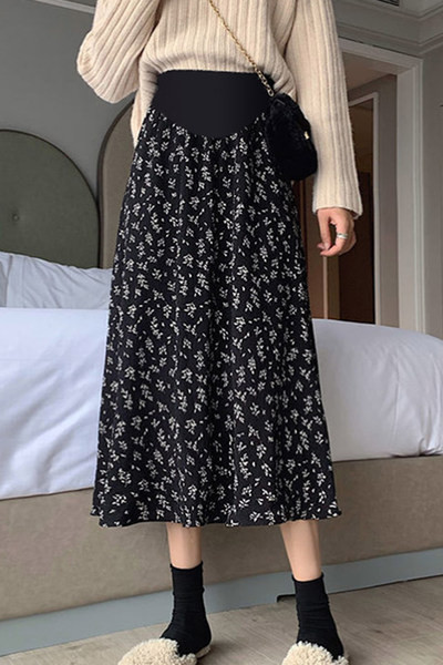 Jauna modeļa garie svārki ar ziedu motīviem grūtniecēm