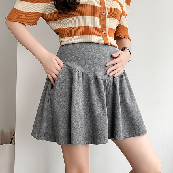 Skraćena trudnička suknja s džepovima