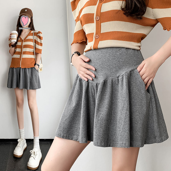 Skraćena trudnička suknja s džepovima