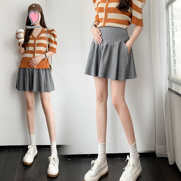 Skraćena trudnička suknja s džepovima