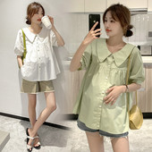 Φαρδύ πουκάμισο εγκυμοσύνης με οβάλ λαιμόκοψη και κουμπιά