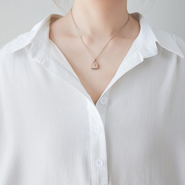 Широка риза с регулиращ се ръкав за бременни