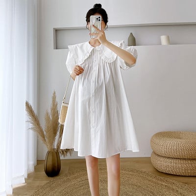 Φαρδύ φόρεμα εγκυμοσύνης με οβάλ λαιμόκοψη και κούμπωμα με κουμπιά