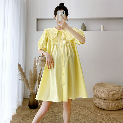 Φαρδύ φόρεμα εγκυμοσύνης με οβάλ λαιμόκοψη και κούμπωμα με κουμπιά