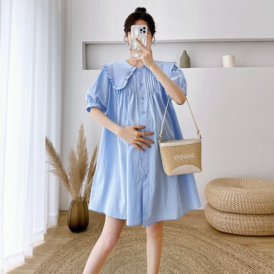 Φαρδύ φόρεμα εγκυμοσύνης με οβάλ λαιμόκοψη και κούμπωμα με κουμπιά