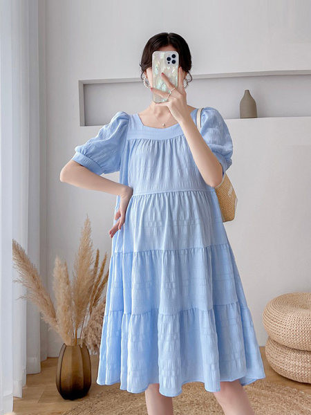 Široka ženska haljina s ovalnim izrezom za trudnice