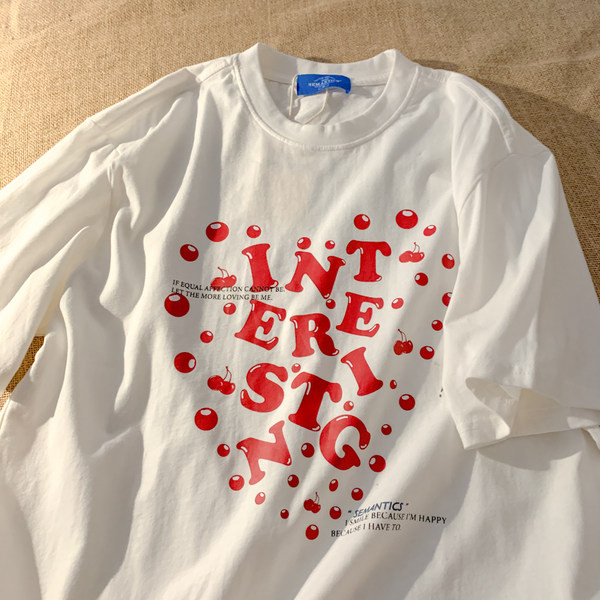 Φαρδύ βαμβακερό μπλουζάκι εγκυμοσύνης με πολύχρωμη στάμπα