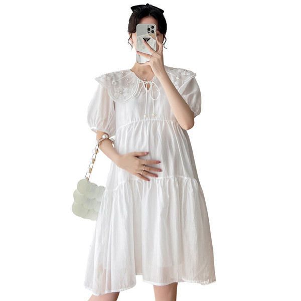 Moderna trudnička haljina s vezom i vezicama