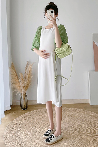 Izgriezt sieviešu kleitu ar tilla piedurknēm