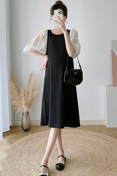 Izgriezt sieviešu kleitu ar tilla piedurknēm