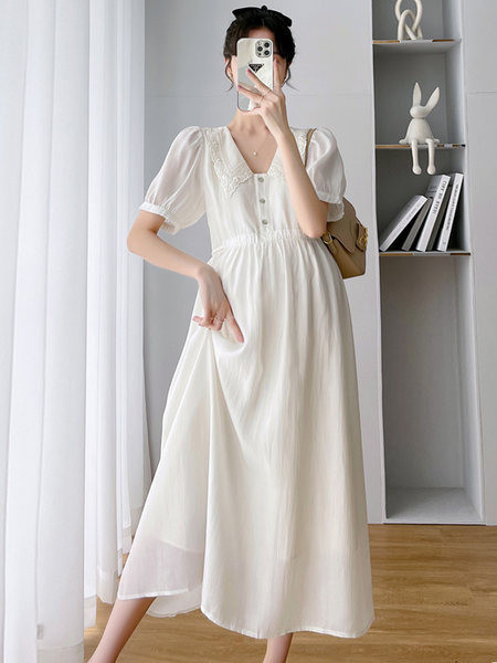 Duga pripijena trudnička haljina s klasičnim ovratnikom i vezom