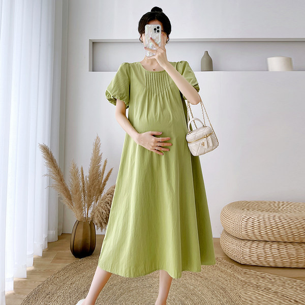 Brīva kokvilnas kleita ar uzpūstām piedurknēm