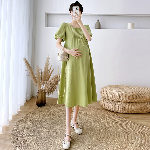 Brīva kokvilnas kleita ar uzpūstām piedurknēm