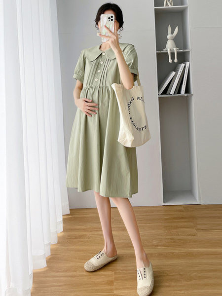 Ženska izrezana haljina s gumbima i ovratnikom