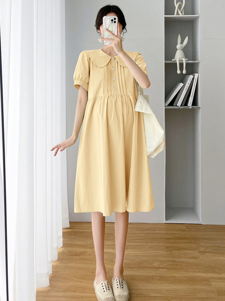 Ženska izrezana haljina s gumbima i ovratnikom