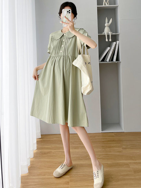 Ženska izrezana haljina s gumbima i ovratnikom