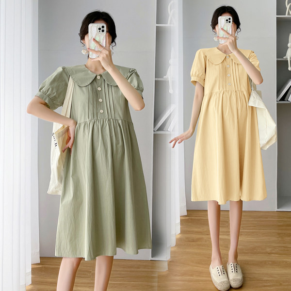 Ženska izrezana haljina s gumbima i ovratnikom