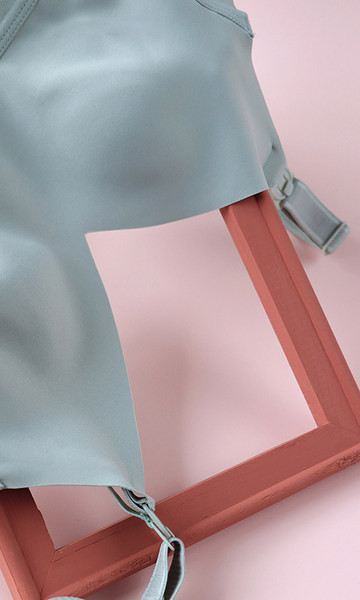 Bezšuvju krūšturis barošanai ar regulējamām lencēm