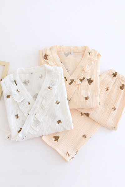 Ženska pamučna pidžama s kovrčama i asimetričnim kopčanjem