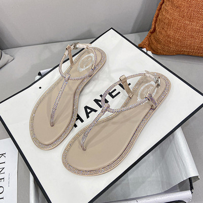 Γυναικεία σανδάλια με επίπεδη σόλα και διακοσμητικές πέτρες