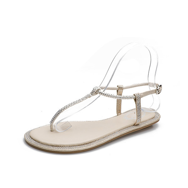 Γυναικεία σανδάλια με επίπεδη σόλα και διακοσμητικές πέτρες