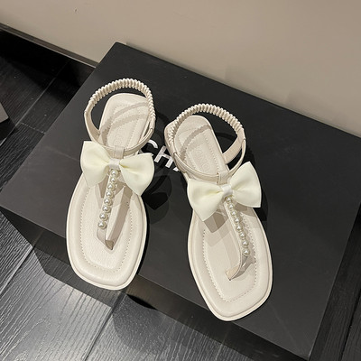 Γυναικεία σανδάλια με κορδέλα και πέρλες