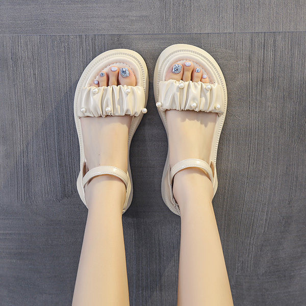 Γυναικεία πέδιλα από οικολογικό δέρμα με διακόσμηση με πέρλες