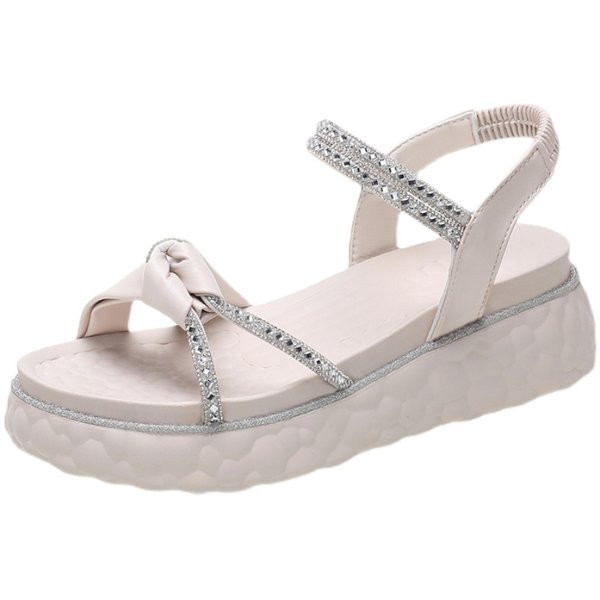 Moderne sandale s visokim potplatom i ukrasnim kamenčićima