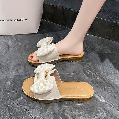 Καλοκαιρινές γυναικείες παντόφλες από οικολογικό δέρμα με κορδέλα