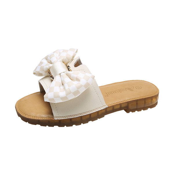 Καλοκαιρινές γυναικείες παντόφλες από οικολογικό δέρμα με κορδέλα