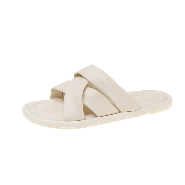 Γυναικείες παντόφλες με επίπεδη σόλα και χιαστί λουράκια