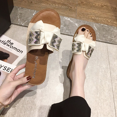 Γυναικείες μοντέρνες παντόφλες από οικολογικό δέρμα με κορδέλα