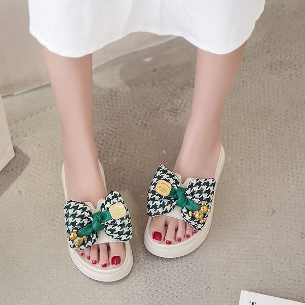 Ženske papuče s tekstilnom kariranom trakom