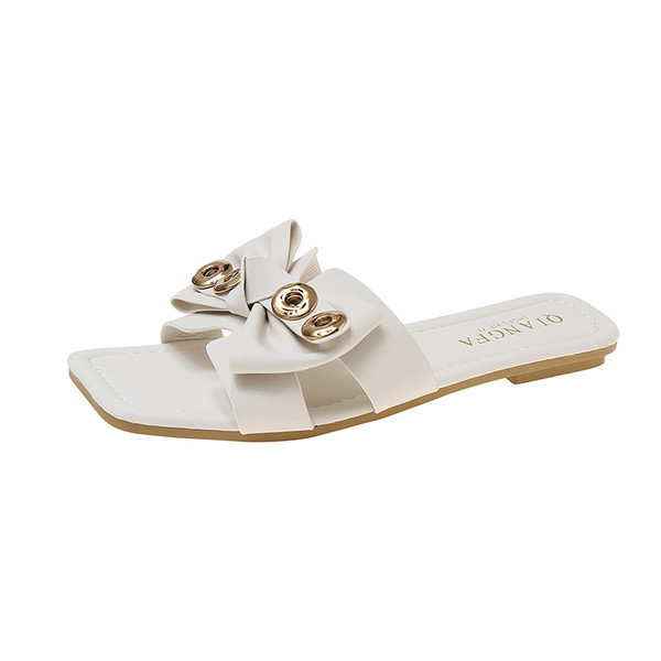 Ženske papuče s niskim ravnim potplatom i trakom od eko kože