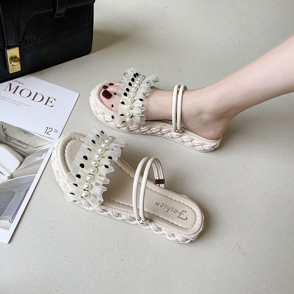 Ženske papuče od eko kože s perlama i ravnim potplatom