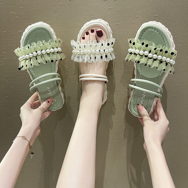 Ženske papuče od eko kože s perlama i ravnim potplatom