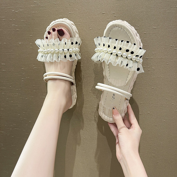 Ženske papuče od eko kože s perlama i ravnim potplatom